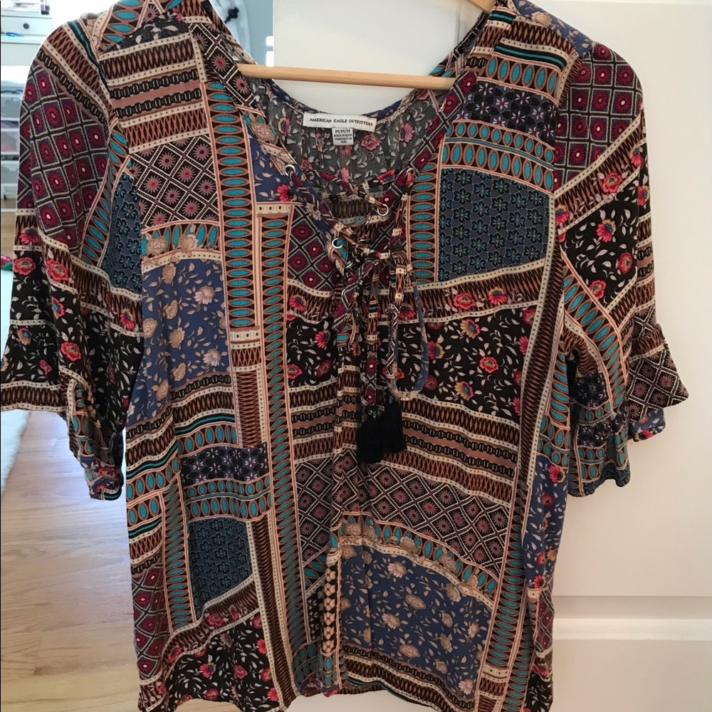 American Eagles outfitters shirt with ruffles sleeve. Worn once.
